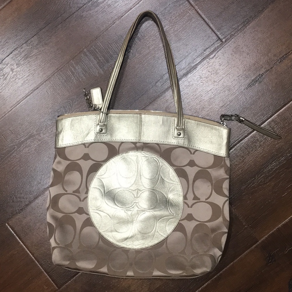 Large golden Coach bag
